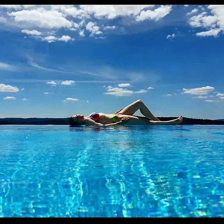 Andrea With Infinity Salty Pool