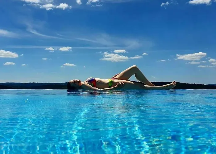 Andrea With Infinity Salty Pool